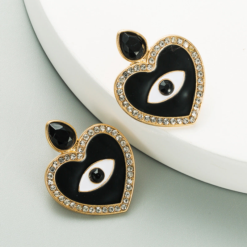 Exaggerated Heart-shaped Evil Eye Diamond Alloy Earrings