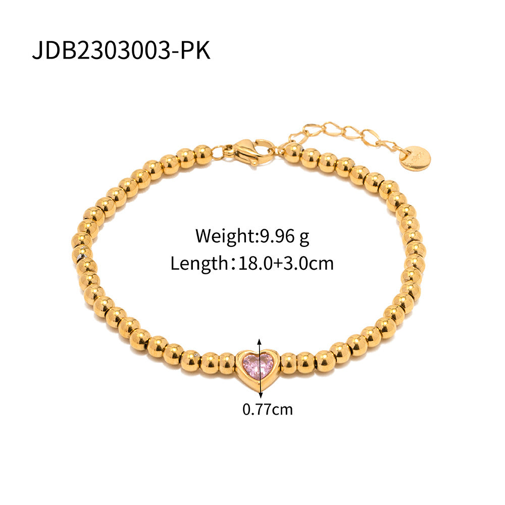 Minimalist Round Beaded Stainless Steel and Titanium Bracelet with 18K Gold Plating and Green Heart Zircon Charm