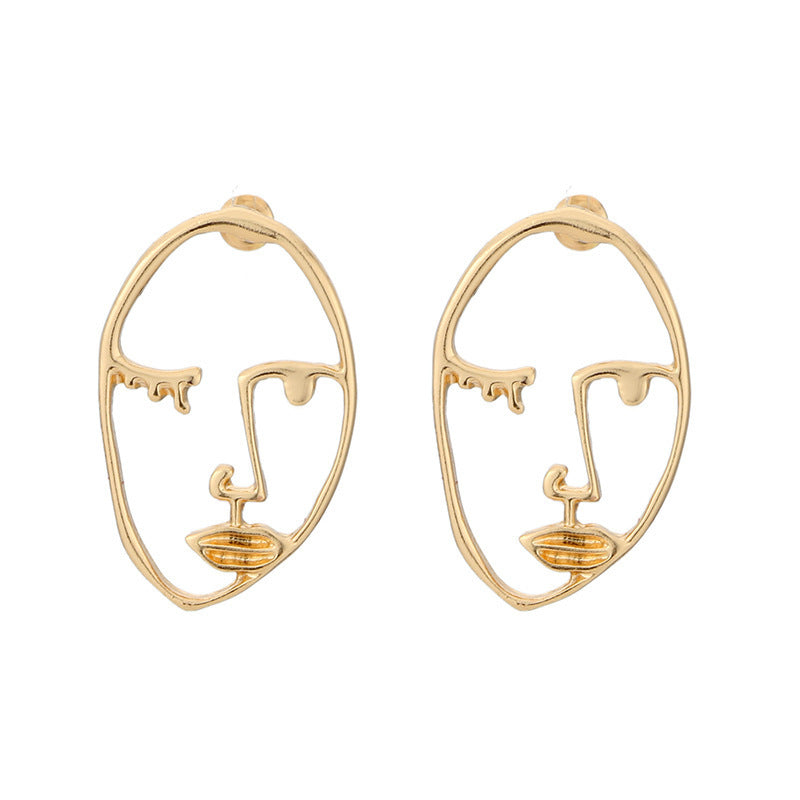 Gold Abstract Face Dangle Earrings with Hollow Eye Design