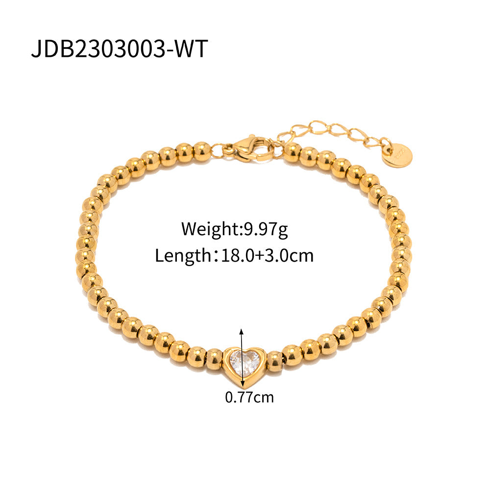 Minimalist Round Beaded Stainless Steel and Titanium Bracelet with 18K Gold Plating and Green Heart Zircon Charm