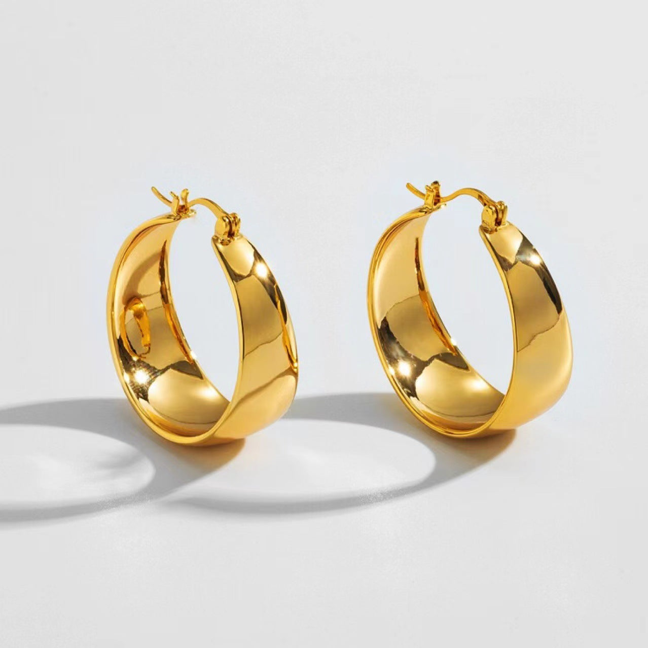 Retro Stainless Steel Plated Hoop Earrings - Hand Polished Curved Design
