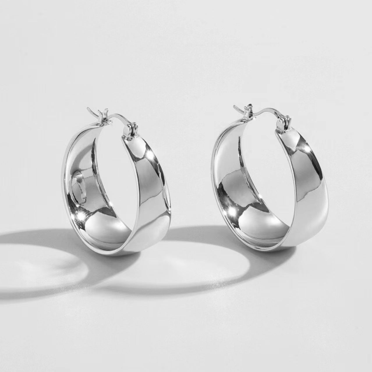Retro Stainless Steel Plated Hoop Earrings - Hand Polished Curved Design