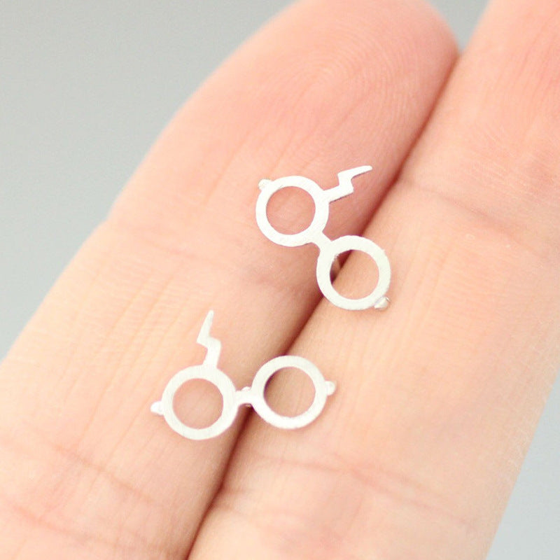 Fashion Titanium Steel Harry Potter Glasses Stud Earrings with Hollow Cartoon Design