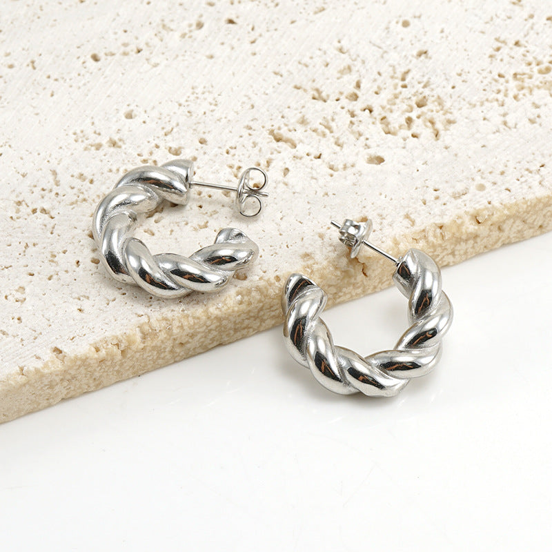 Fashion Geometric Twist Titanium Steel Hoop Earrings