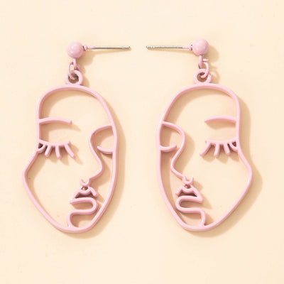 Gold Abstract Face Dangle Earrings with Hollow Eye Design