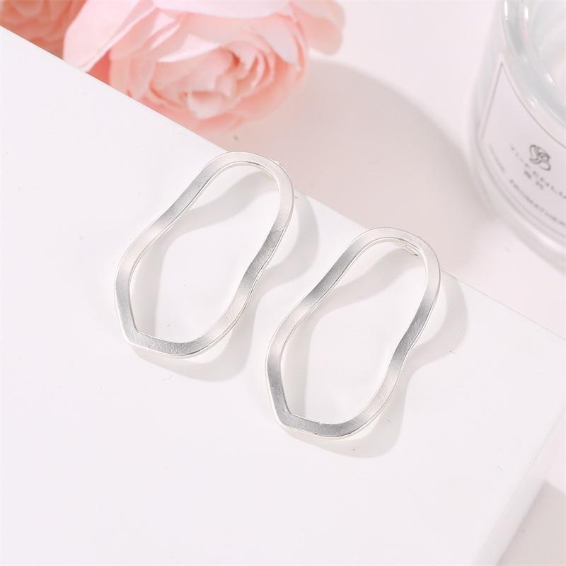 European Geometric Irregular Hollow Wave Gold Earrings