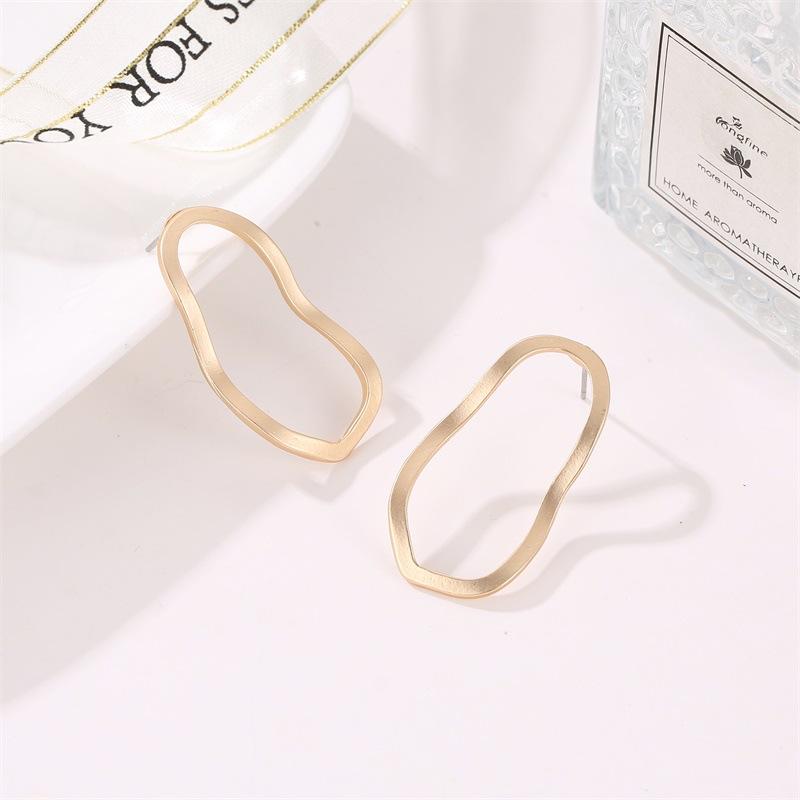 European Geometric Irregular Hollow Wave Gold Earrings