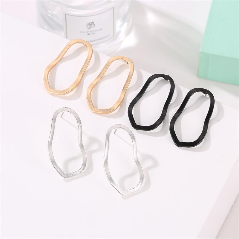 European Geometric Irregular Hollow Wave Gold Earrings
