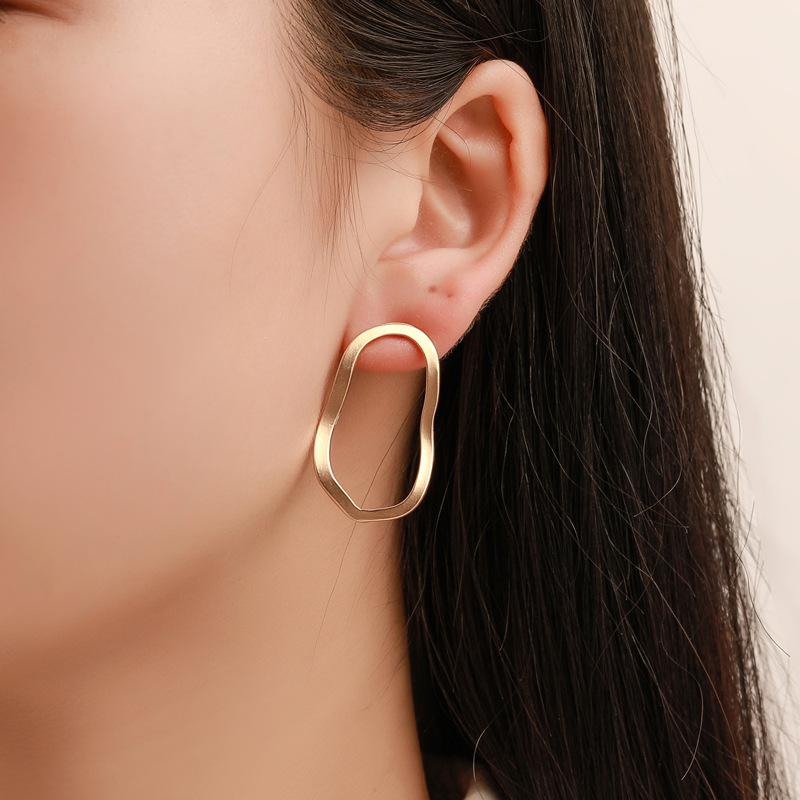 European Geometric Irregular Hollow Wave Gold Earrings
