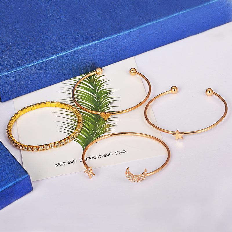Simple and Stylish Star and Moon Studded Glossy Peach Heart Bracelet Set