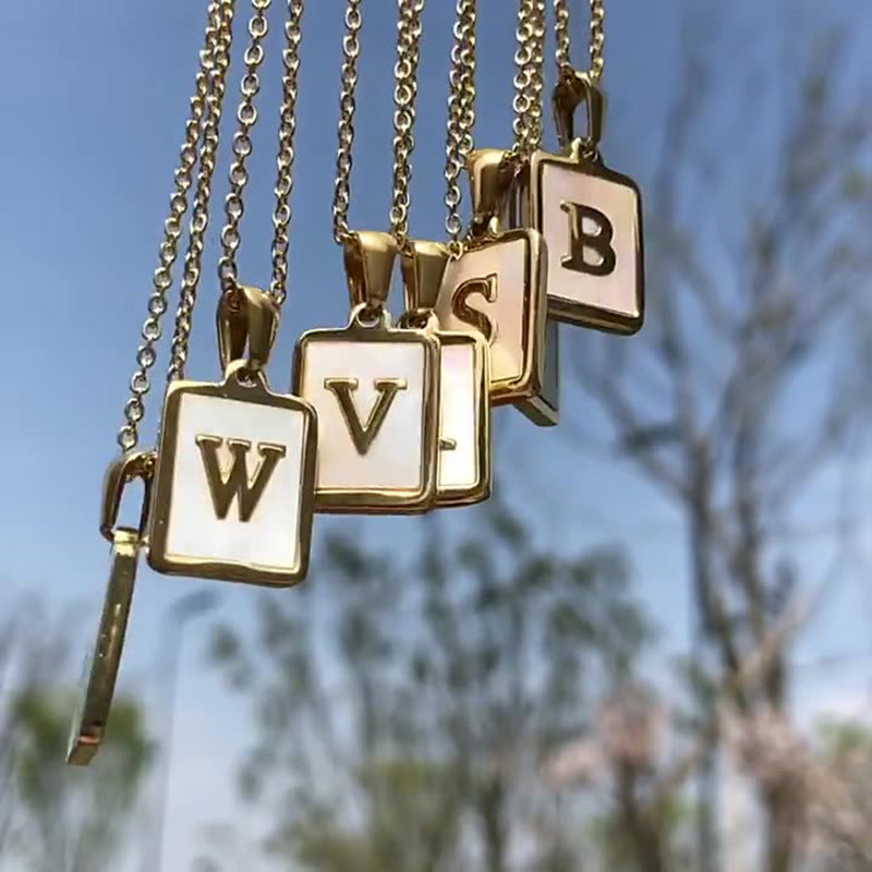 Unisex 18k Gold Plated Stainless Steel Letter Pendant Necklace with White Shell Accents