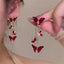 Fairy Style Asymmetrical Butterfly Tassel Earrings with Red Zircon and Artificial Pearls