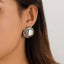 Retro Geometric Alloy Earrings with Irregular Metal Droplets