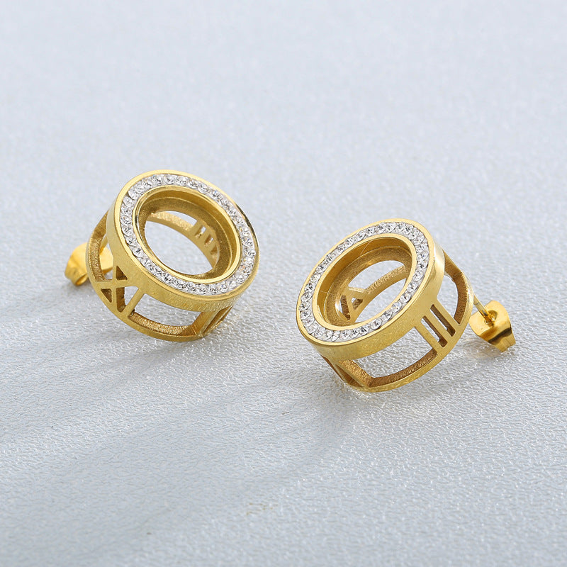 "Stainless Steel Rhinestone Stud Earrings with Gold-Plated Zircon Roman Numeral Design"