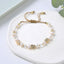 Fashion Heart Shape Freshwater Pearl Bracelet with Sequins and Love Charm