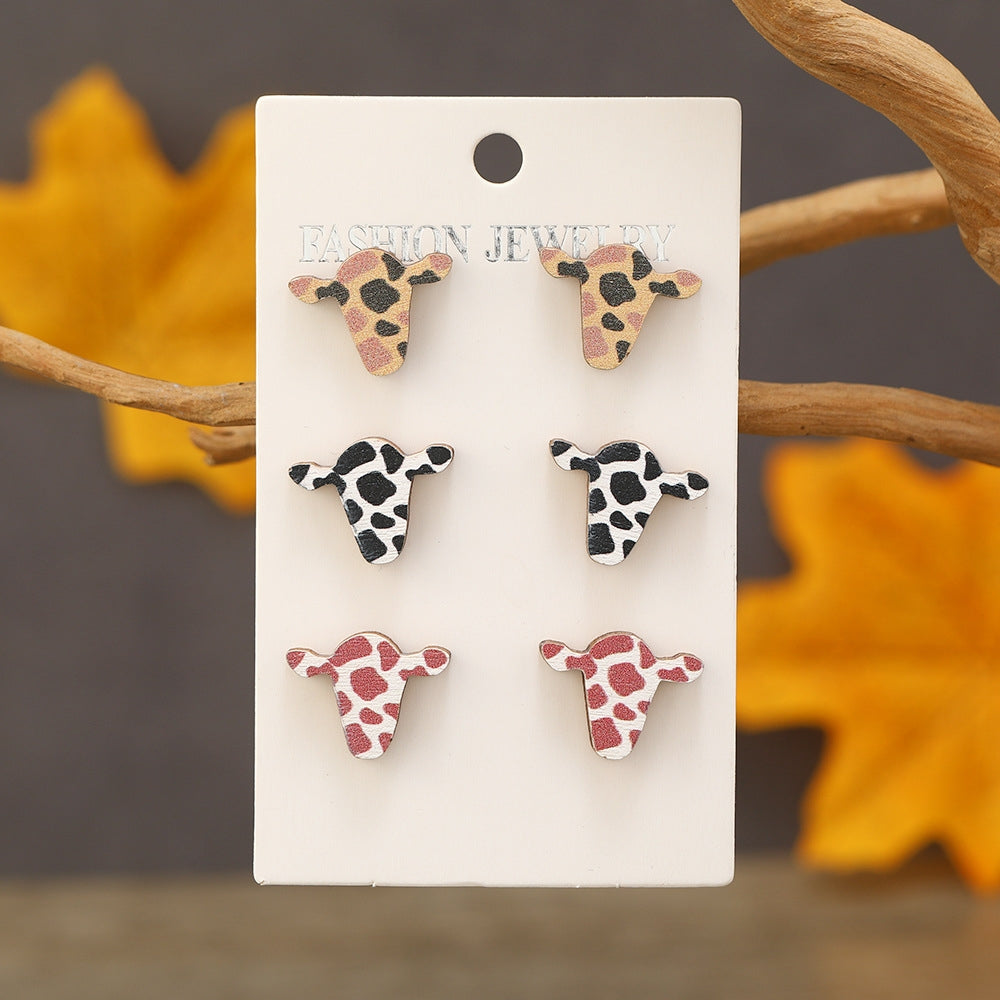 Cartoon Style Colorful Spotted Cattle Wood Ear Studs Set