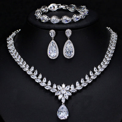 Luxurious Bridal Zirconia Snowflake Jewelry Set - Earrings, Necklace, and Bracelet in White Gold Plated Copper