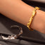 Elegant Wave Pattern 18K Gold Plated Stainless Steel Bangle Bracelet for Women