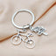 Casual Retro Bicycle Alloy Keychain with Direction Sign Pendant