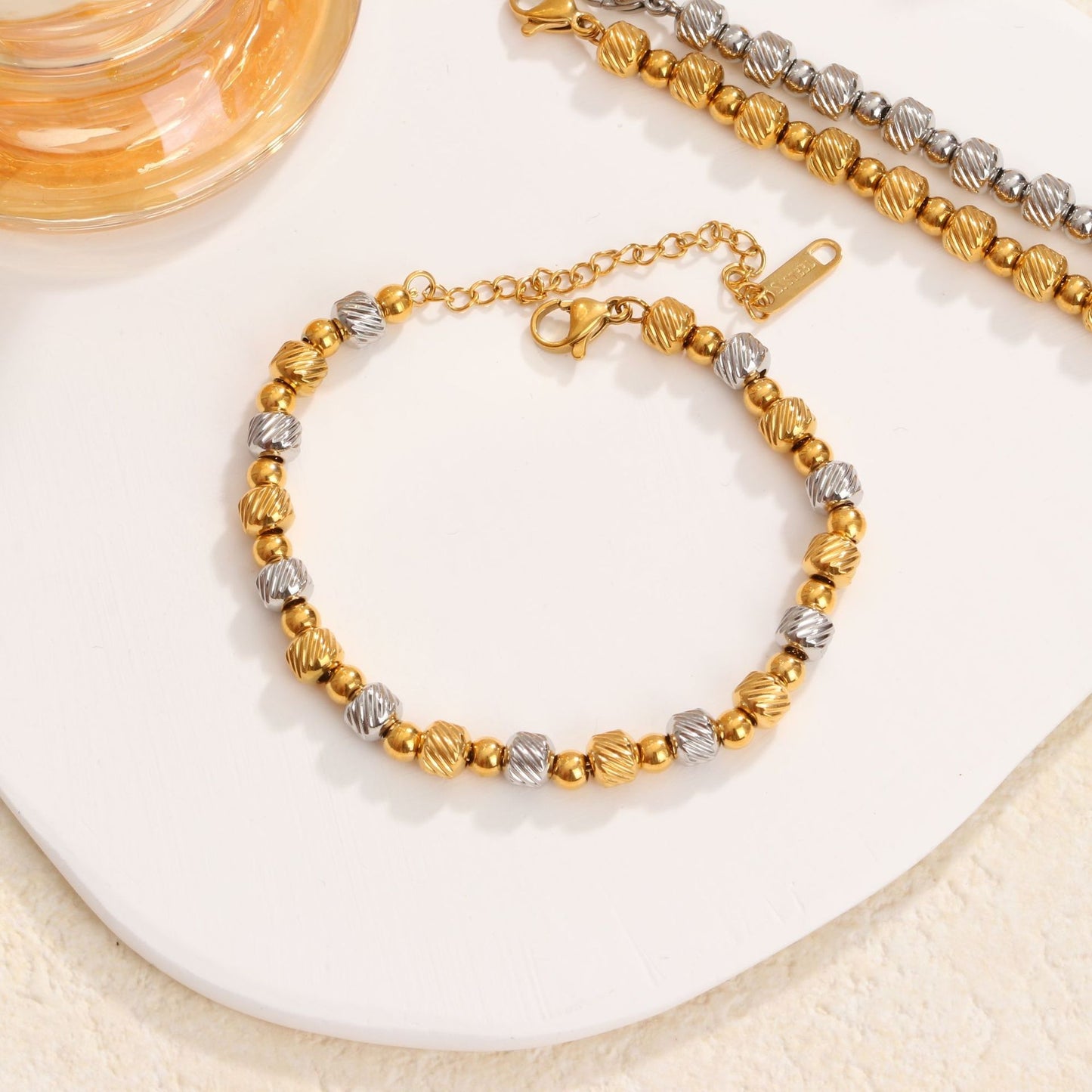 18K Gold Plated Titanium Steel Round Beaded Bracelet with Gold and Silver Color-Blocked Design