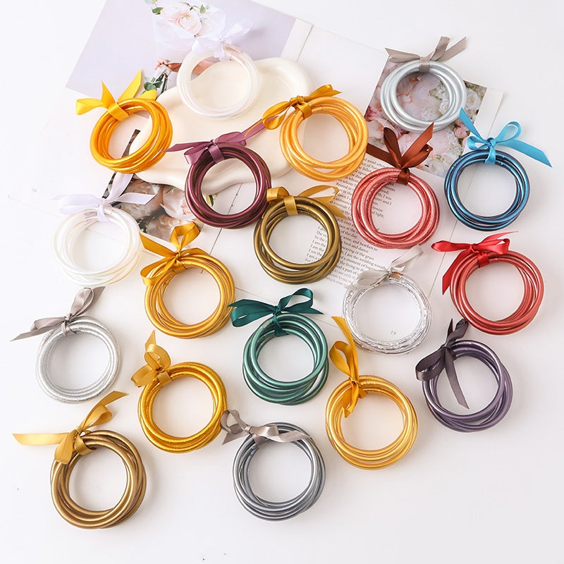 Casual Solid Color Bow Knot Gold Foil Women's Silicone Wristband Bracelet