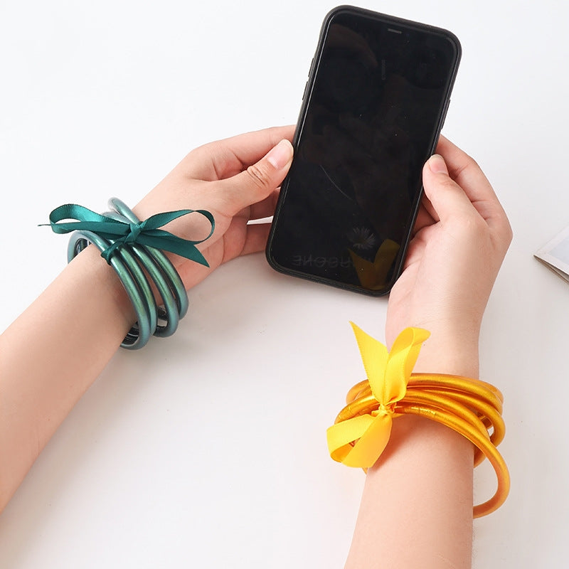 Casual Solid Color Bow Knot Gold Foil Women's Silicone Wristband Bracelet