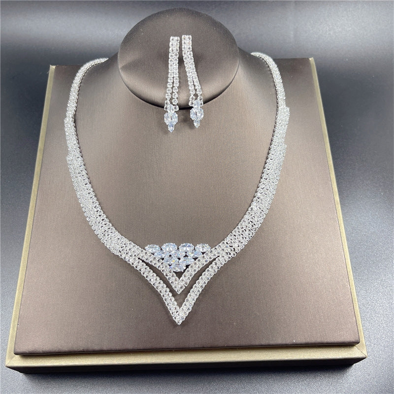 Classic Rhinestone Jewelry Set: Necklace, Earrings, Ring, and Bracelet for Bridal and Evening Wear