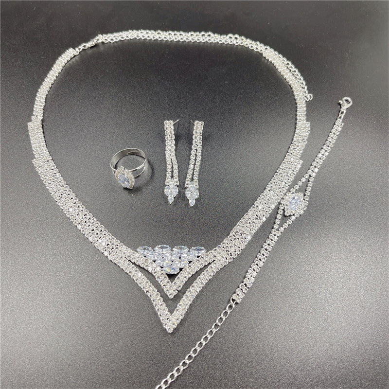 Classic Rhinestone Jewelry Set: Necklace, Earrings, Ring, and Bracelet for Bridal and Evening Wear