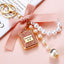 Cute Bow Knot Perfume Bottle Pearl Keychain for Women