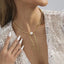 Elegant Artistic Tassel Alloy Pendant Necklace with Faux Pearl Accents