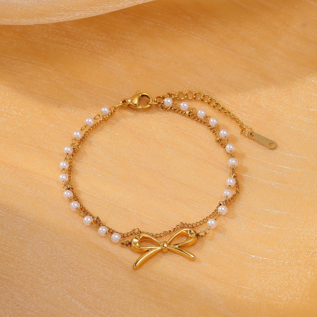 Elegant Titanium Steel Bow Knot Pearl Bracelet - 18K Gold-Plated Women's Jewelry