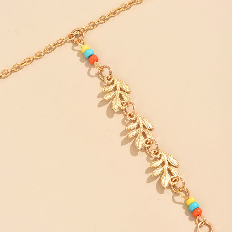 Elegant Leaf Alloy Plated Women's Bracelet with Rice Bead Finger Chain