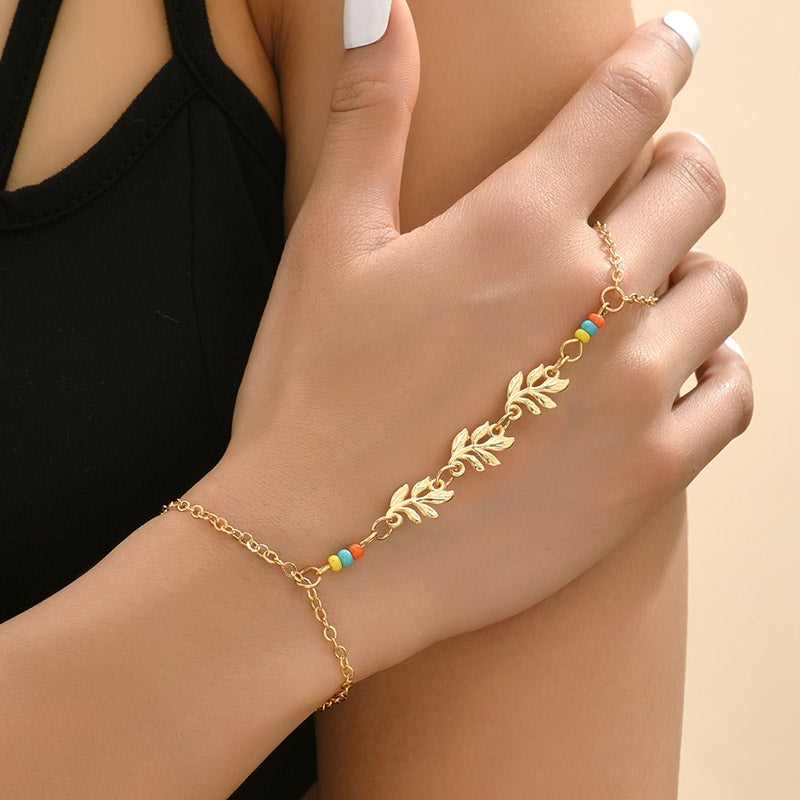 Elegant Leaf Alloy Plated Women's Bracelet with Rice Bead Finger Chain