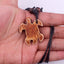 Ethnic Tortoise Resin Pendant Necklace with Faux Bone Carving