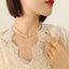 Elegant Pearl & Flower Titanium Steel Necklace - 18K Gold Plated Freshwater Design