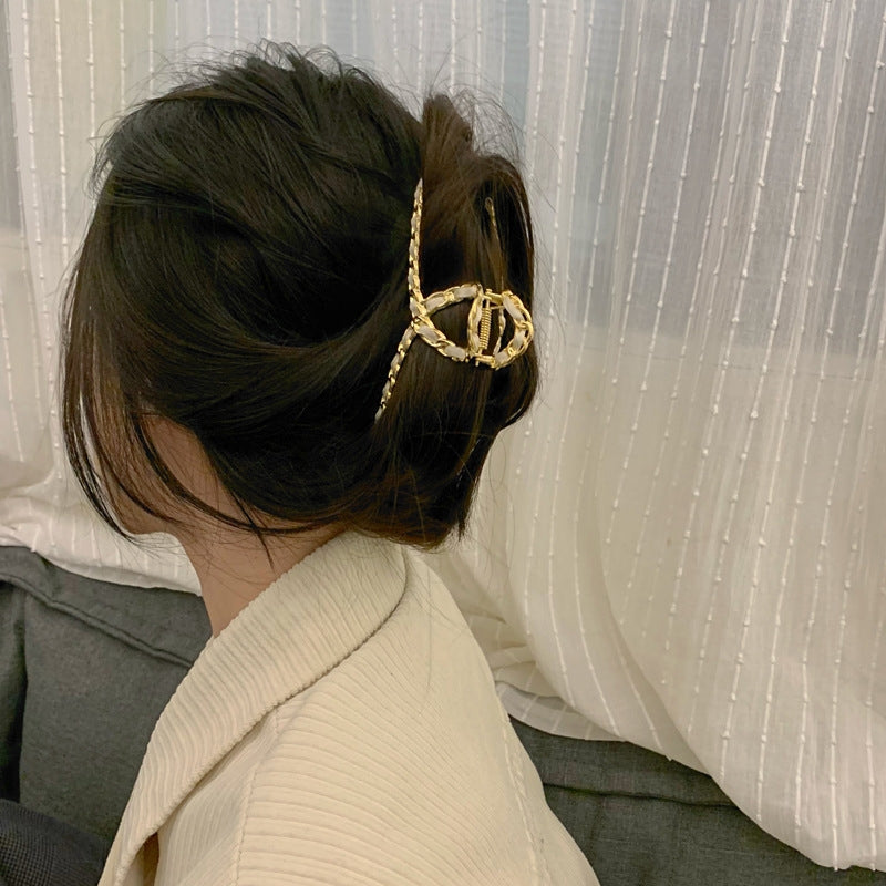 Geometric Alloy Ribbon Hair Claw with Cross Cut-Out Design