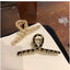 Geometric Alloy Ribbon Hair Claw with Cross Cut-Out Design