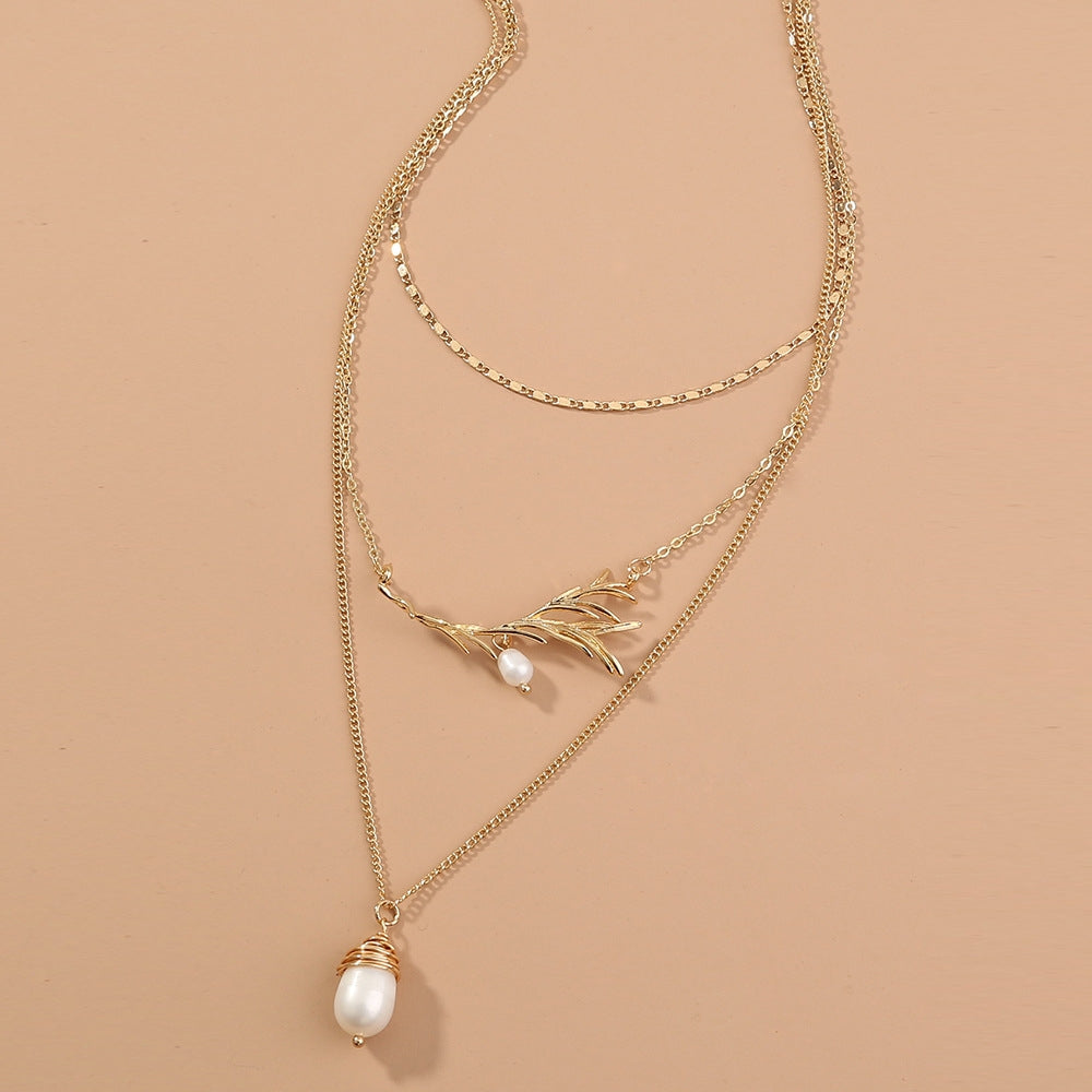 Elegant Baroque Pearl Layered Necklace with Gold Branch Leaf Design