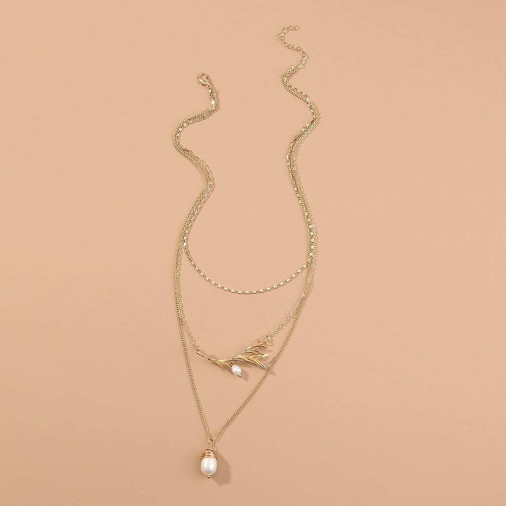 Elegant Baroque Pearl Layered Necklace with Gold Branch Leaf Design