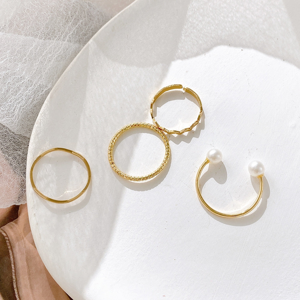 Fashion Simple Pearl Wave Twist Joint Alloy Ring Set - Four Pieces