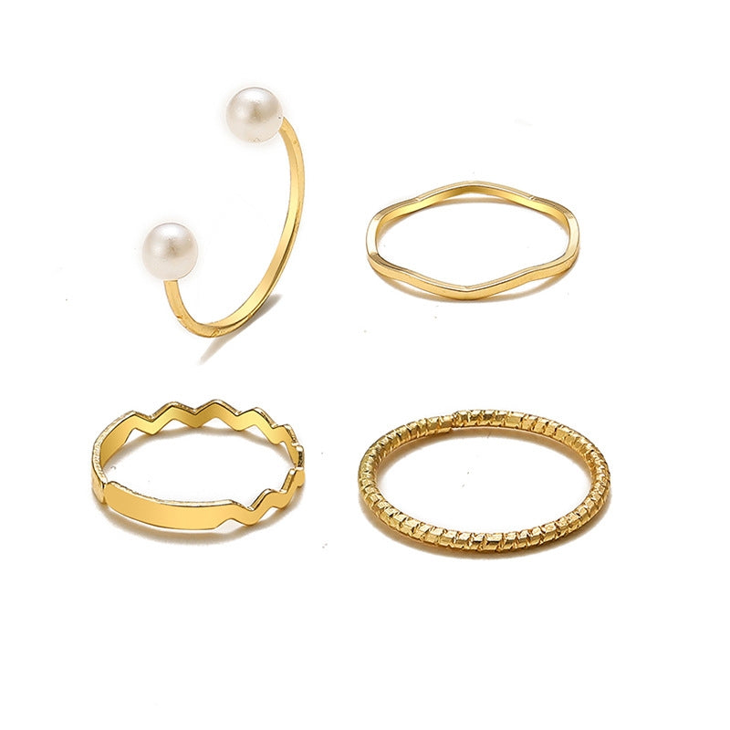 Fashion Simple Pearl Wave Twist Joint Alloy Ring Set - Four Pieces