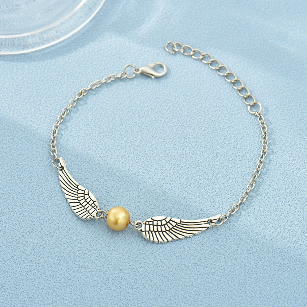 Elegant Winged Pearl Alloy Bracelet - Multi-Color Pendant Design for Women