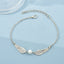 Elegant Winged Pearl Alloy Bracelet - Multi-Color Pendant Design for Women