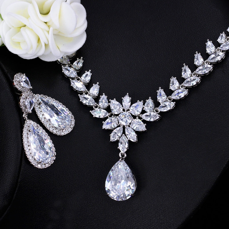 Luxurious Bridal Zirconia Snowflake Jewelry Set - Earrings, Necklace, and Bracelet in White Gold Plated Copper