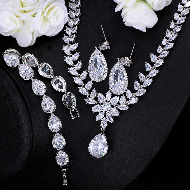 Luxurious Bridal Zirconia Snowflake Jewelry Set - Earrings, Necklace, and Bracelet in White Gold Plated Copper