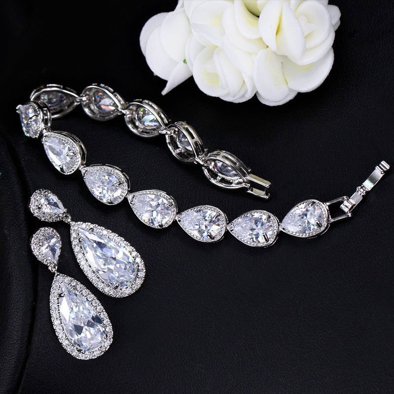 Luxurious Bridal Zirconia Snowflake Jewelry Set - Earrings, Necklace, and Bracelet in White Gold Plated Copper