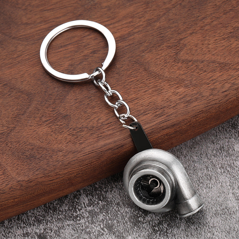 Simple Alloy Unisex Keychain with Creative Car Parts Design