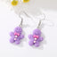 Cartoon Gingerbread Man Resin Earrings with Bow - Three-Dimensional Design