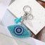 Vintage Style Heart Eye PU Leather Keychain with Rhinestone Tassel Pendant