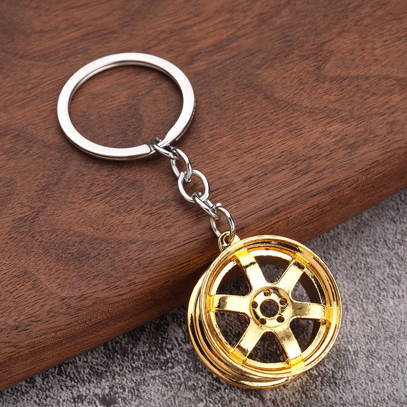 Simple Alloy Unisex Keychain with Creative Car Parts Design